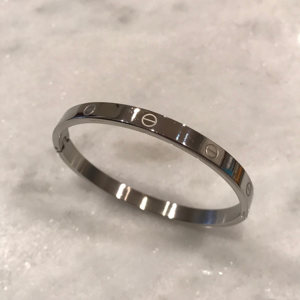Hinged bangle, stainless with circle detail